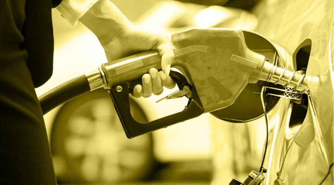 Person holding fuel pump